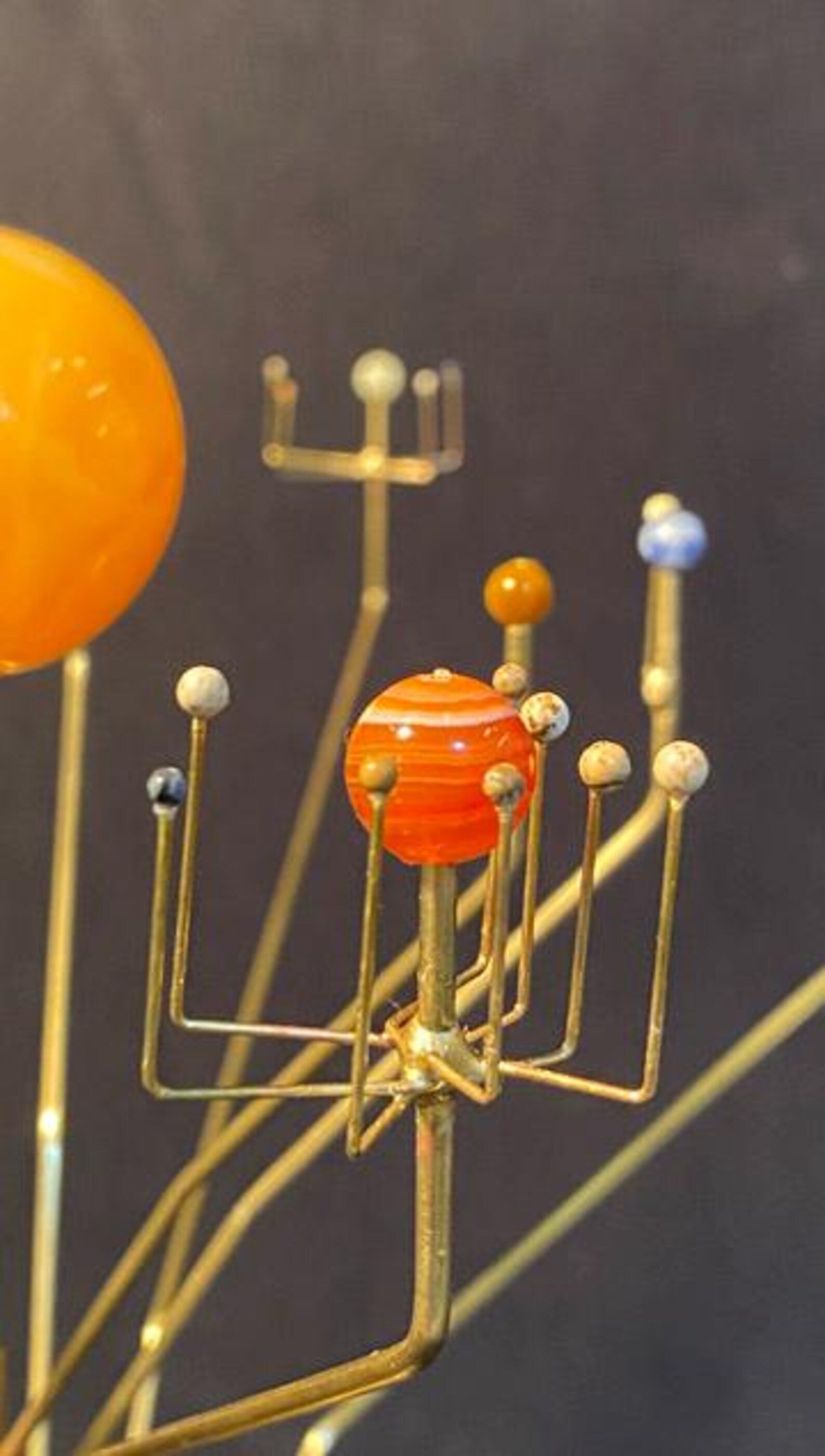 Close up of the planet Jupiter depicted as a banded agate stone.