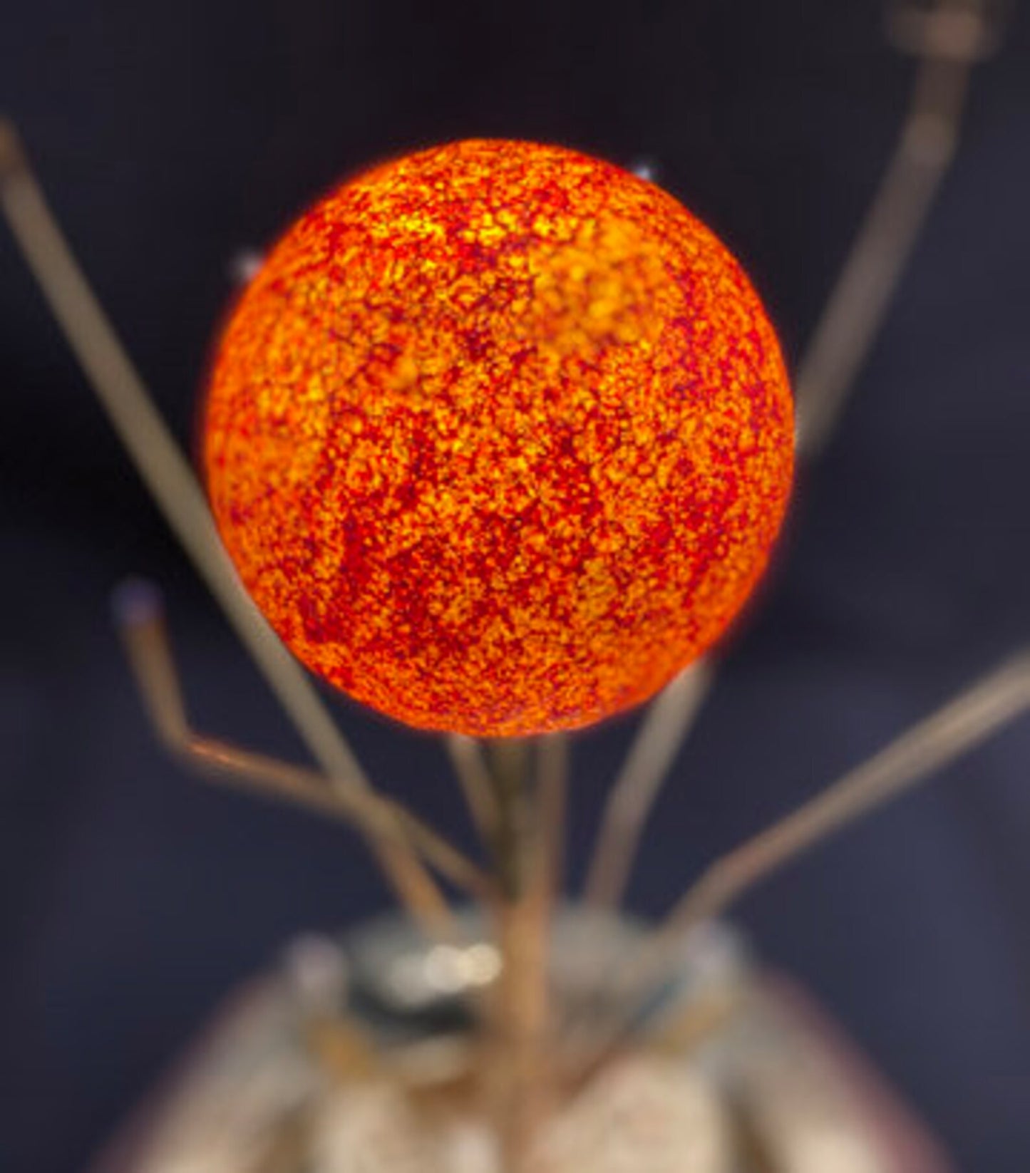 Close up of the Sun on the Renaissance Orrery from Science Art .  Handpainted globe depicting the Sun in realistic hydrogen alpha filter