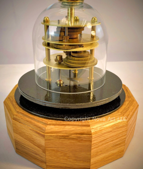 solar system model of orrery in natural oak base