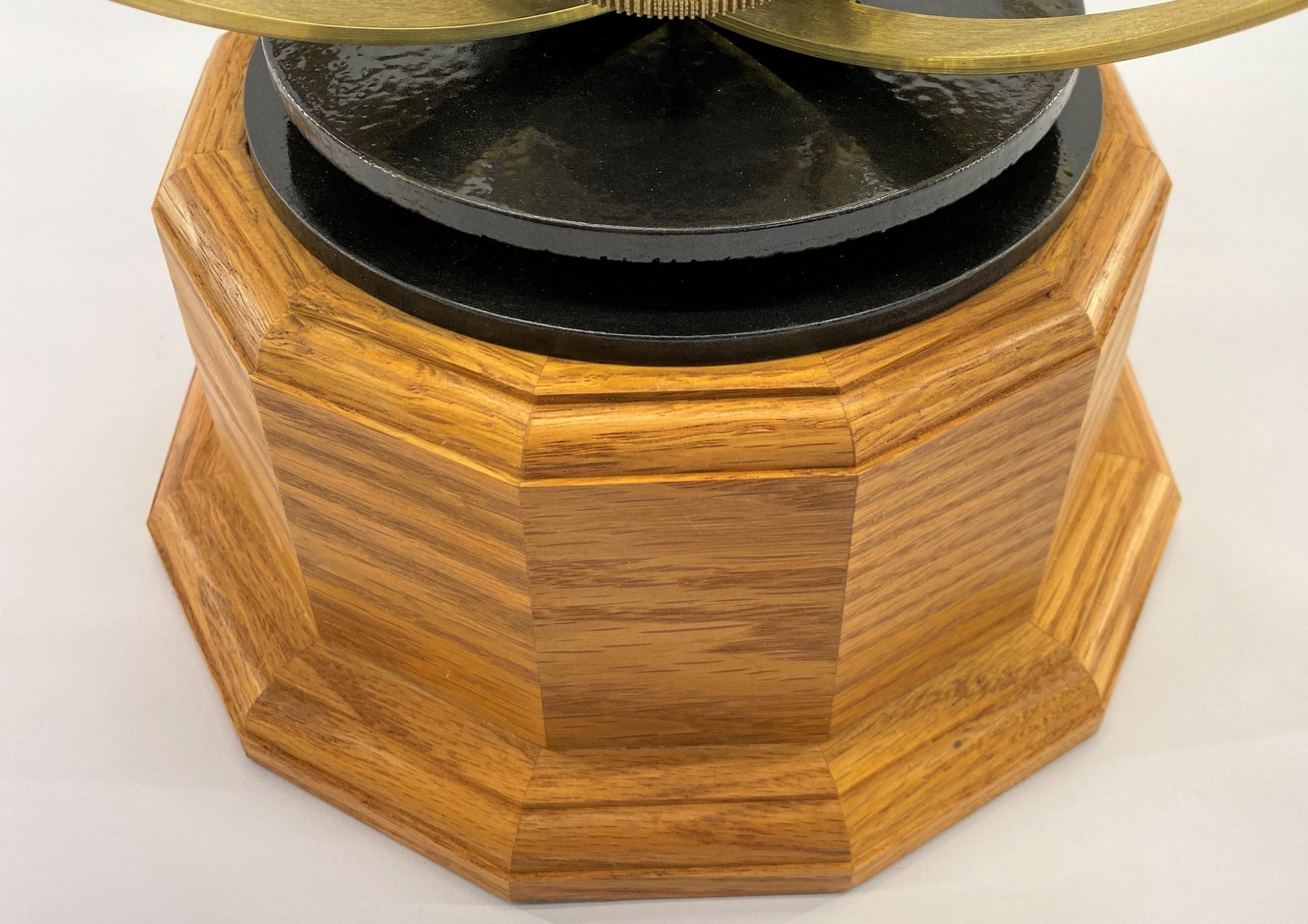 Close up photo of natural oak hardwood base on the Tower Orrery from Science Art