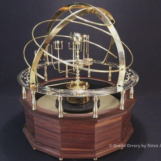 Grand orrery from science art depicting correct relative orbital motion of the planets. This set is with brass and hematite sun and planets