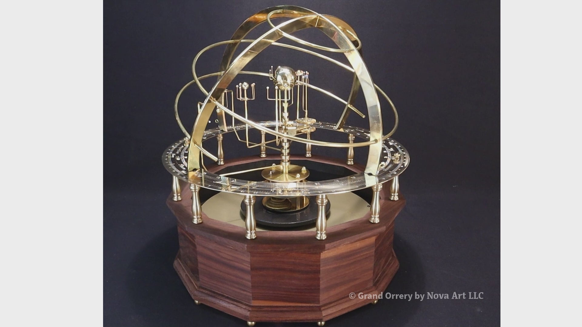 Grand orrery from science art depicting correct relative orbital motion of the planets. This set is with brass and hematite sun and planets