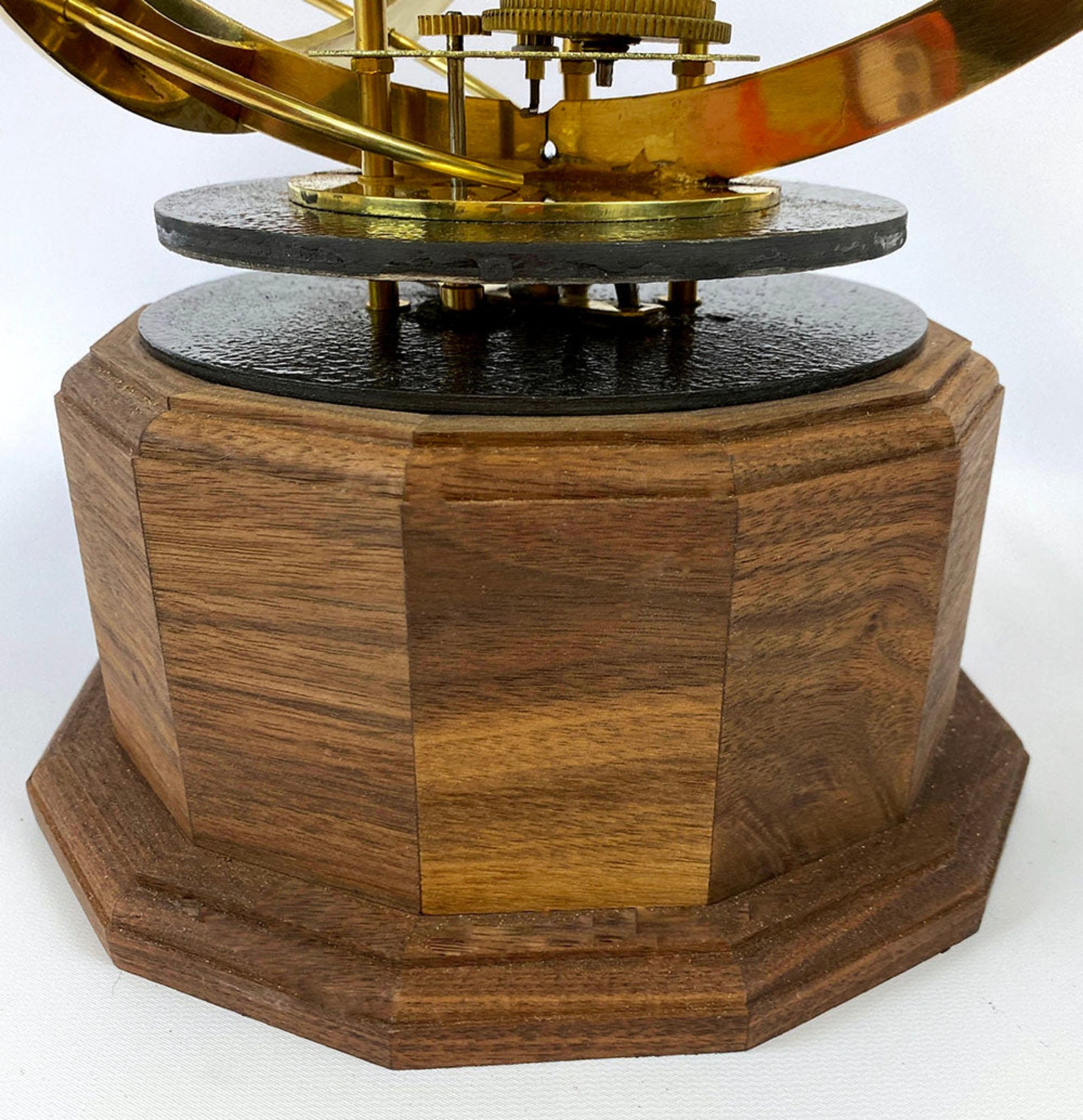 Close up photo of solid walnut hardwood base of Tower Orrery from Science Art