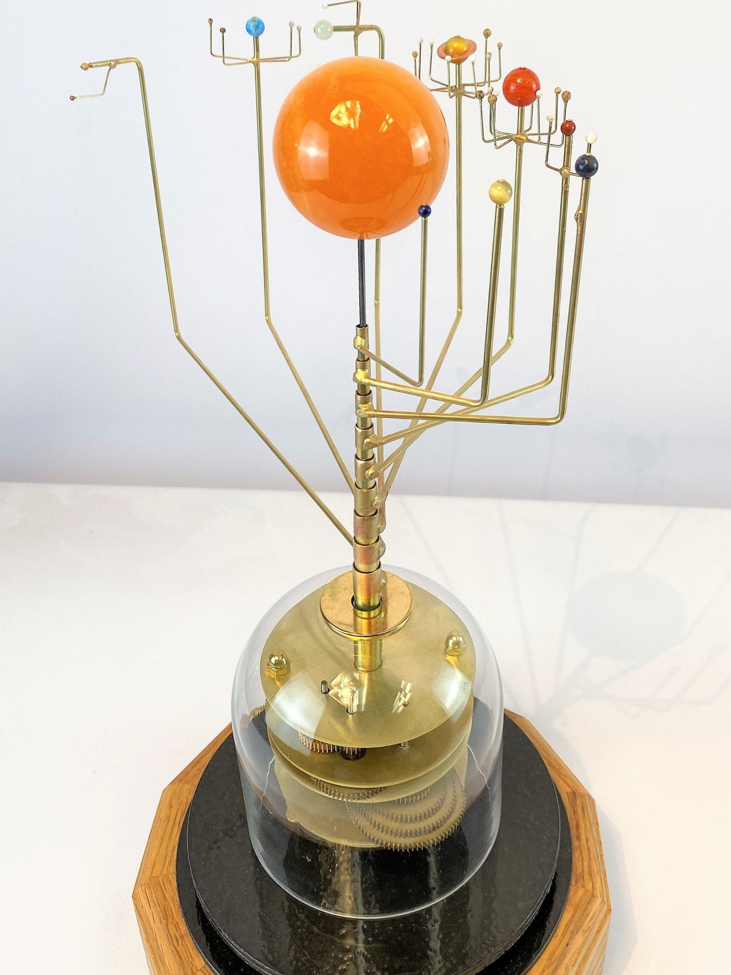 Wanderers Orrery from Scienceart.com with semi-precious stone planets and brass gears under glass dome